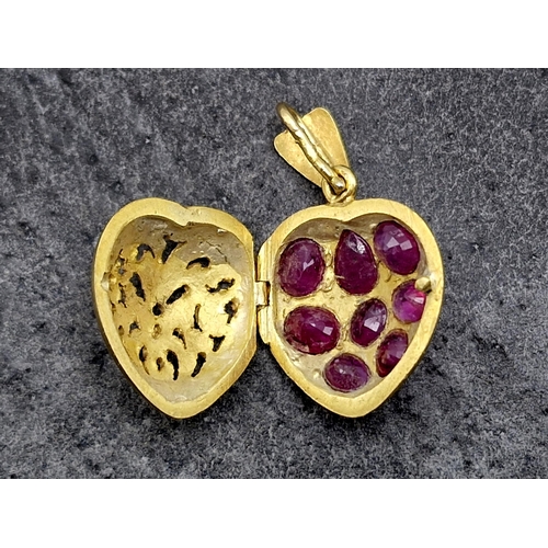 99 - Victorian period Indian 22ct and natural ruby pave set heart locket pendant, 2.7 x 1.6cm, 5.9g