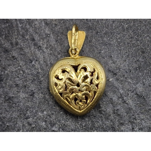 99 - Victorian period Indian 22ct and natural ruby pave set heart locket pendant, 2.7 x 1.6cm, 5.9g