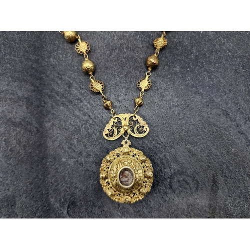 108 - Early Spanish colonial Philippines sterling silver gilt necklace and filigree locket pendant with wo... 