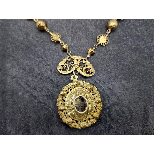 108 - Early Spanish colonial Philippines sterling silver gilt necklace and filigree locket pendant with wo... 