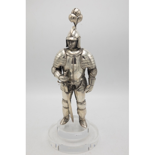 192 - Well modelled early 20th century silver figure of a standing knight, in traditional armour with swor... 