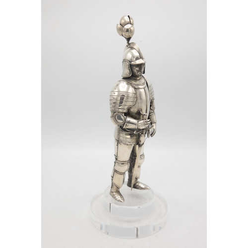 192 - Well modelled early 20th century silver figure of a standing knight, in traditional armour with swor... 