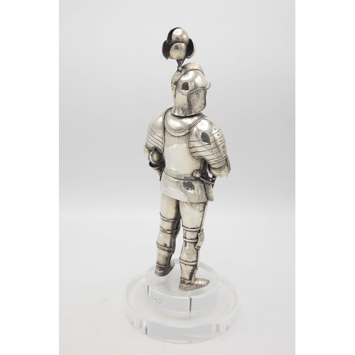 192 - Well modelled early 20th century silver figure of a standing knight, in traditional armour with swor... 