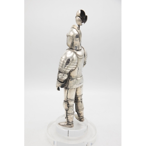 192 - Well modelled early 20th century silver figure of a standing knight, in traditional armour with swor... 