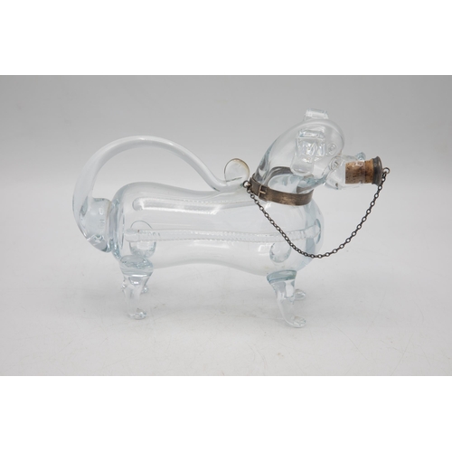 483 - 1930s novelty hand blown glass decanter in the form of a dog, with silver plate collar and chain wit... 