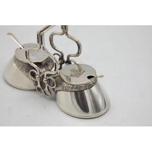 206 - Hunting Interest - Novelty silver plate twin cruet in the form of horses hooves, with bridle tack ha... 