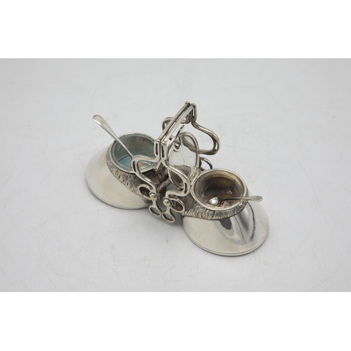 206 - Hunting Interest - Novelty silver plate twin cruet in the form of horses hooves, with bridle tack ha... 