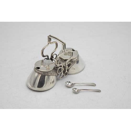 206 - Hunting Interest - Novelty silver plate twin cruet in the form of horses hooves, with bridle tack ha... 