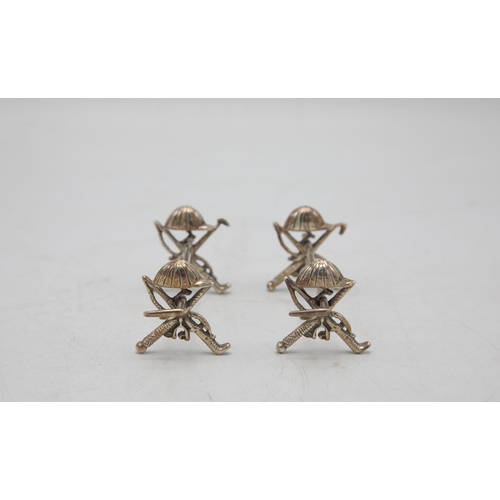 207 - Polo Interest - Novelty pair of equestrian spoon rests, with hat, crop, whip and stirrup detail, mak... 