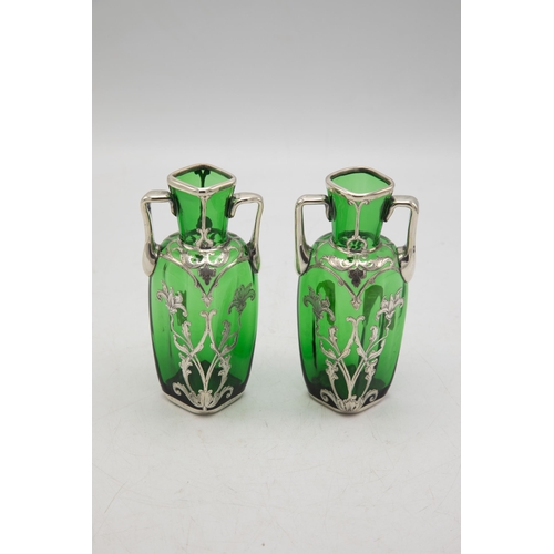 209 - Pair on 1920s American green glass twin handled vases with silver floral overlay, 14cm high