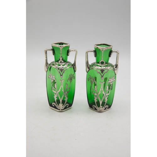 209 - Pair on 1920s American green glass twin handled vases with silver floral overlay, 14cm high