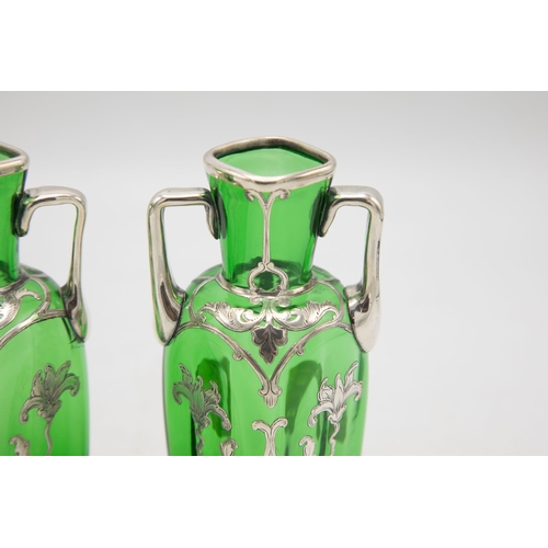 209 - Pair on 1920s American green glass twin handled vases with silver floral overlay, 14cm high