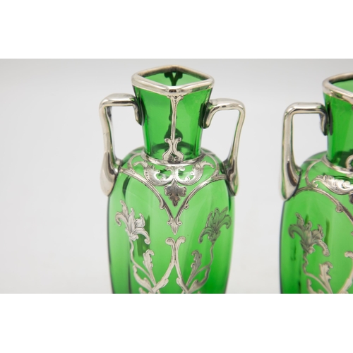 209 - Pair on 1920s American green glass twin handled vases with silver floral overlay, 14cm high