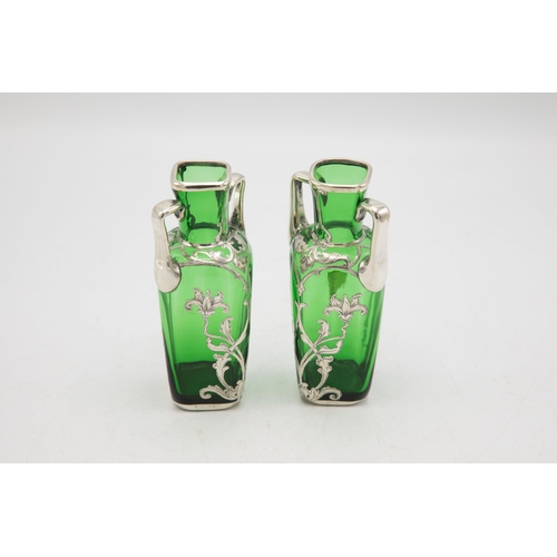 209 - Pair on 1920s American green glass twin handled vases with silver floral overlay, 14cm high