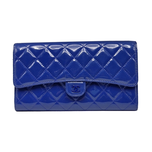 281 - Chanel blue leather shiny clutch bag with cash wallet, card holder and passport cover, to include or... 