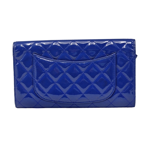 281 - Chanel blue leather shiny clutch bag with cash wallet, card holder and passport cover, to include or... 