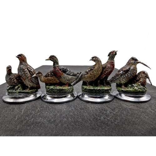 265 - Four antique Austrian cold painted bronze menu holders of game birds to include pheasant, snipe and ... 