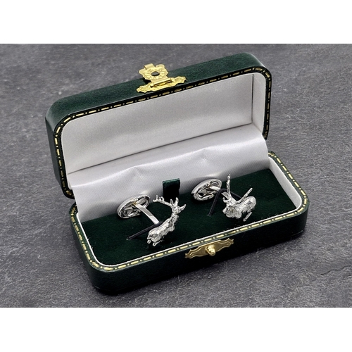 269 - Holland & Holland chrome stag cufflinks, boxed