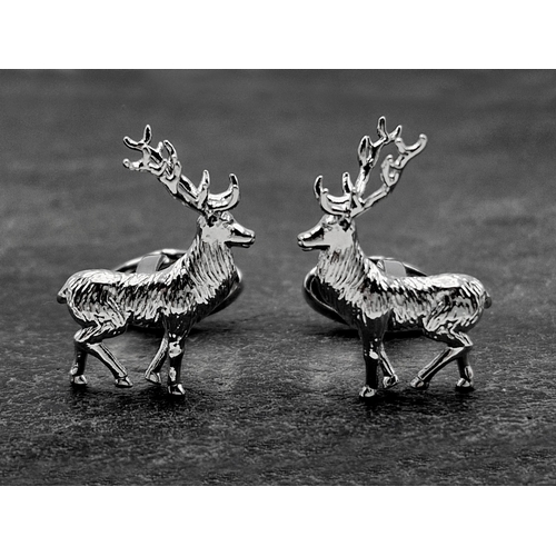 269 - Holland & Holland chrome stag cufflinks, boxed