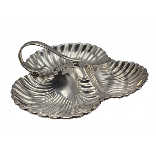 172 - Mappin & Webb silver scallop shell sweetmeat dish, Sheffield 1930, 23cm wide, 9.5oz approx