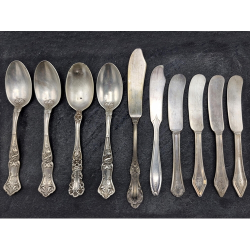 218 - Collection of American Sterling silver, five cast silver butter knives, further floral butter knife,... 