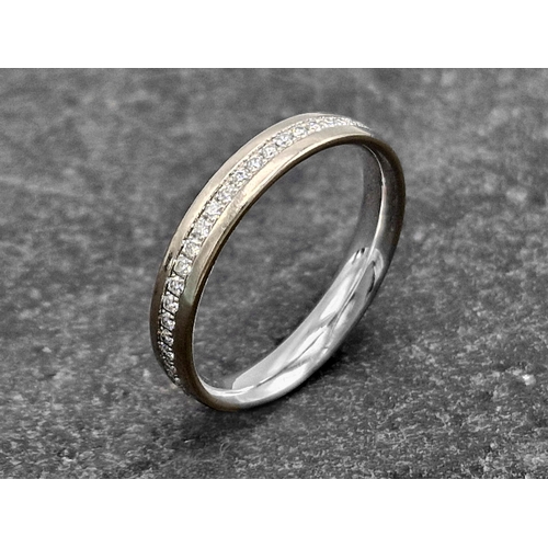 128 - Tiffany & Co 18ct white gold eternity ring, marked 'Tiffany & Co, AU 750, Belgium', with original ri... 