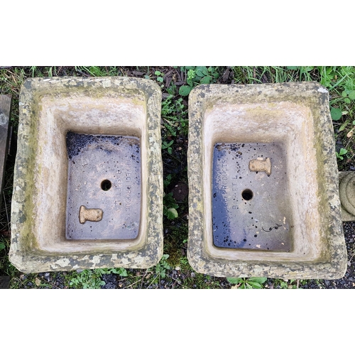 1009 - Pair of weathered reconstituted stone garden planters in the form of baskets stamped Arveci Products... 