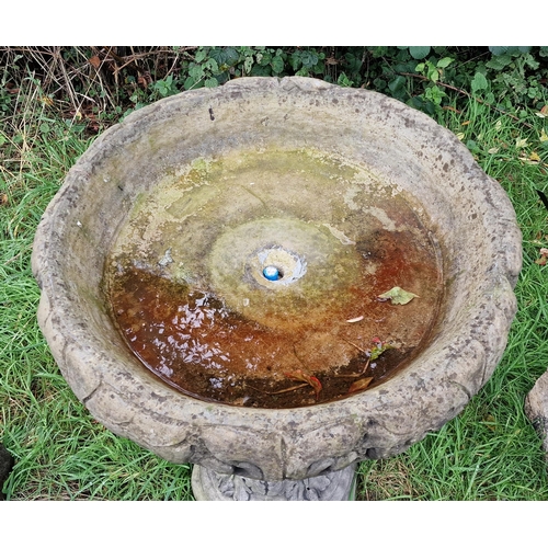 1021 - Large reconstituted stone two sectional bird bath raised on a fluted column pedestal with acanthus l... 