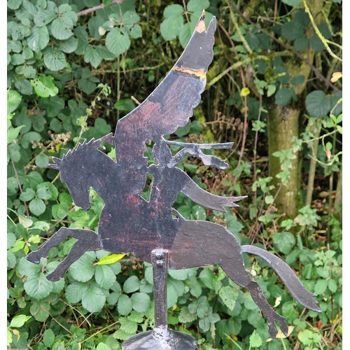 1023 - Painted iron weathervane of Pegasus and Bellerophon raised on a stone block, H 132cm