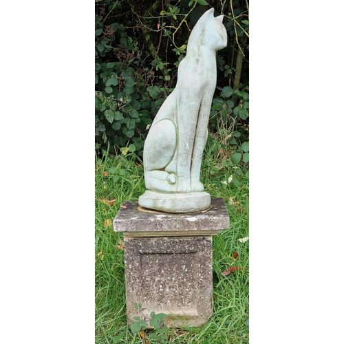 1025 - Reconstituted stone garden ornament of a Siamese cat raised on an associated plinth, H 90cm