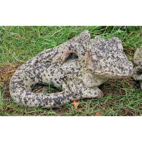 1026 - Two weathered reconstituted stone garden ornaments in the form of dragons, H 46cm (2)