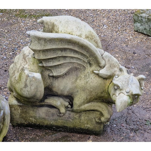 1034 - Pair of good quality weathered reconstituted stone garden ornament of mythical griffins, H 40cm (2)