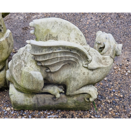 1034 - Pair of good quality weathered reconstituted stone garden ornament of mythical griffins, H 40cm (2)