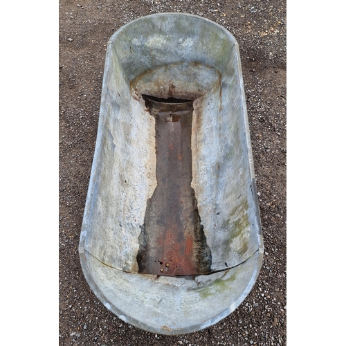 1038 - Vintage galvanised bath raised on strapwork supports, H 46cm x W 143cm x D 60cm