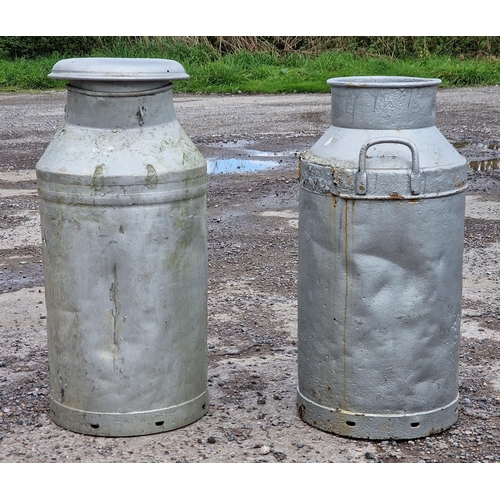 1043 - Two vintage galvanised milk churns, one lidded, H 76cm (2)