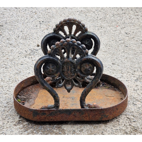 1053 - 19th century cast iron boot scraper with pierced detail and lions paw feet, H 29cm x W 41cm x D 27cm