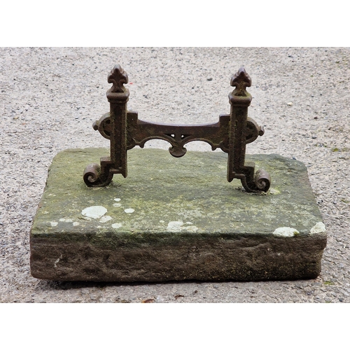 1055 - Victorian cast iron boot scraper set in a natural stone block, H 26cm x W 44cm x D 34cm