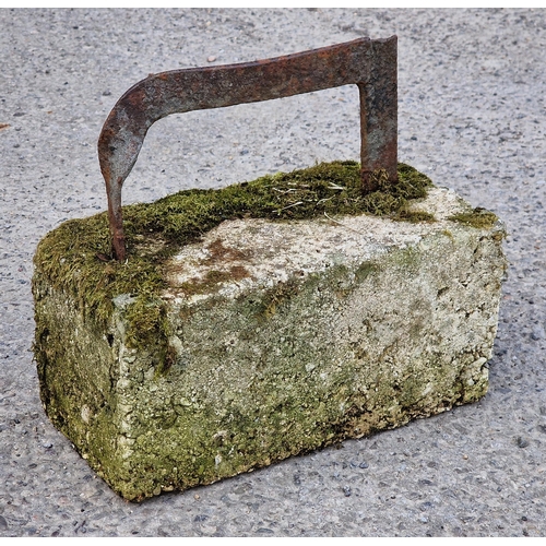 1056 - Antique iron boot scraper set in a stone block, H 28cm x W 32cm x D 17cm