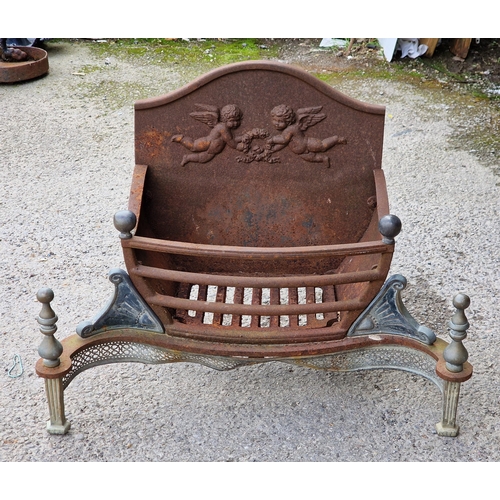 1061 - Antique cast iron fire basket with cherub relief and pierced detail, H 51cm x W 67cm x D 32cm