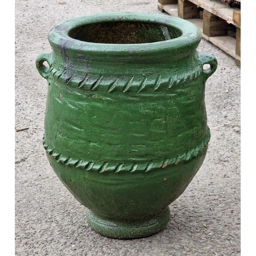 1070 - Painted terracotta urn with twin loop handles and incised detail, H 48cm