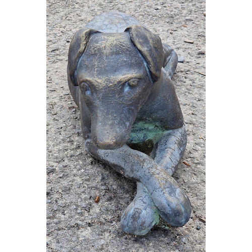 1088 - Terracotta bronzed effect ornament of a recumbent greyhound, H 123cm x W 60cm (AF)