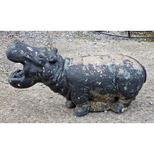 1089 - Painted reconstituted stone garden statue of a hippo with glass eyes, H 32cm x W 58cm x D 20cm