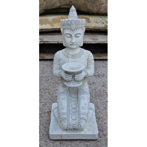 1091 - Composite garden ornament of a kneeling buddha, H 56cm x W 24cm