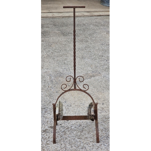 1109 - Victorian wrought iron boot scraper with scrollwork detail, H 104cm