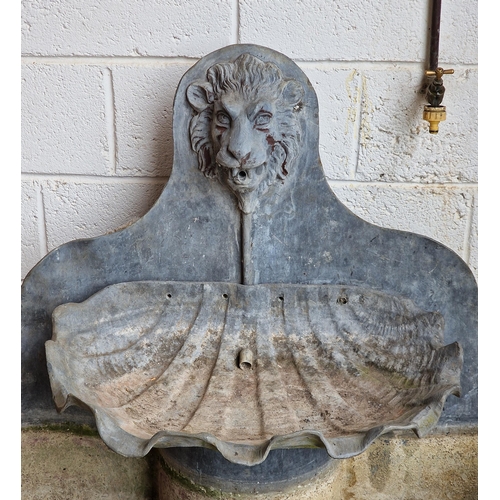 1128 - Exceptional quality antique bow front lead water feature with lions mask and urn detail, complete wi... 