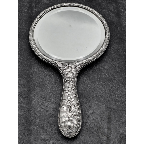 163 - Mixed silver - toast rack, engine turned propelling pencil and repousse dressing mirror (3)