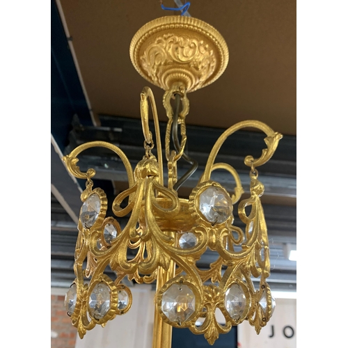 1410 - Gilt metal and crystal glass ceiling chandelier, having an ornate multi tiered scrolled frame, D 40c... 