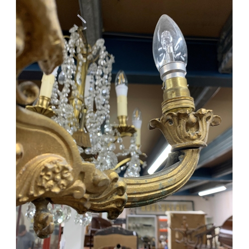 1413 - Victorian gold gilt four branch ceiling chandelier, decorated with ornate serpentine's throughout wi... 