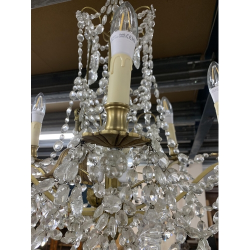 1414 - Ornate crystal drop six branch ceiling chandelier, having central Corinthian column and scrolled bra... 