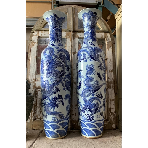 414 - Pair of enormous Chinese export blue and white porcelain floral vases, typical palette with scrolled... 